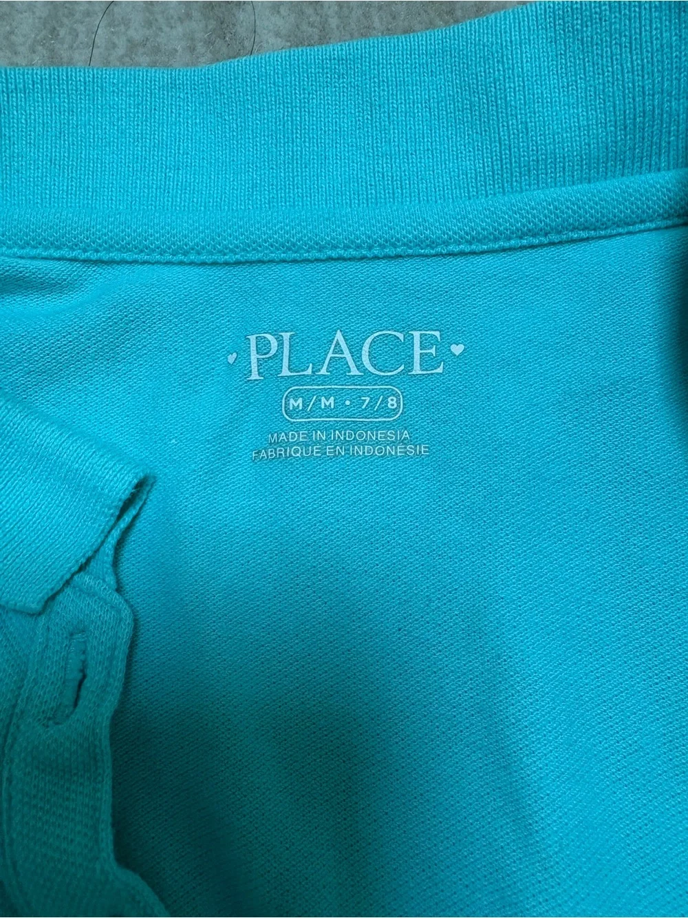 The Children's Place Aqua/teal Polo Top with ruffle trim. Size M (7-8)